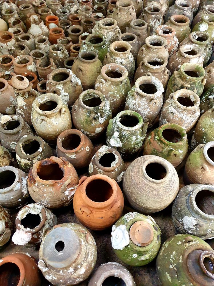Old jars in Antique Museum, Wat Chedi Hoi, Pathum Thani, Thailand