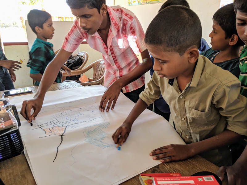 Kids preparing a map of Palugamam, Sri  Lanka