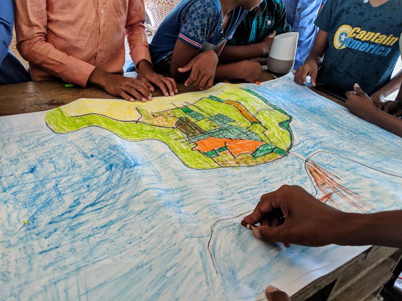 Kids preparing a colorful map of Palugamam, Sri  Lanka