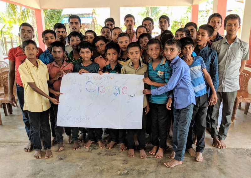 Kids showing the Thank you Google Map message