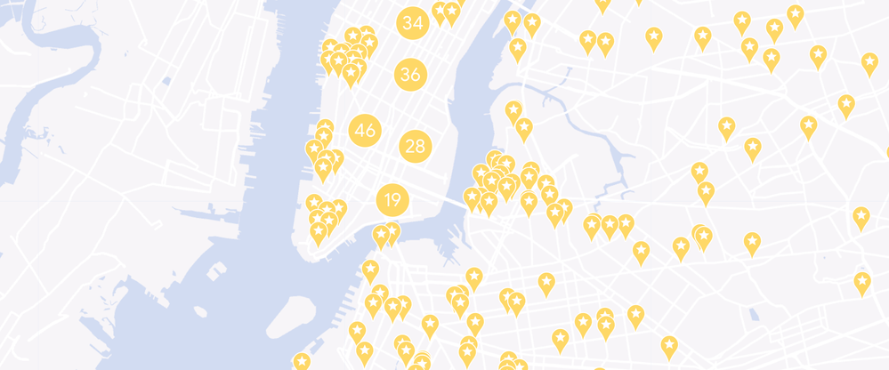 Caption: A screenshot of the New York City map, showcasing yellow pins to indicate businesses on the Local Favorites list.