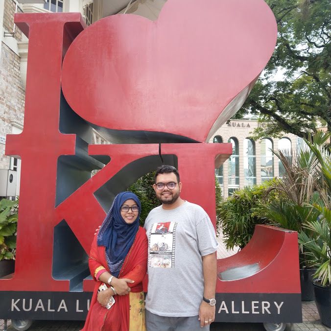 Caption: A photo of Sumaiya and her husband @PavelSarwar posing in front of an “I love Kuala Lumpur” sign. (Courtesy of Local Guide @SumaiyaZafrinC)