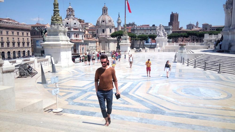Caption: A photo of Google Moderator @BorrisS walking up the steps of the Victor Emmanuel II Monument in Rome, Italy.