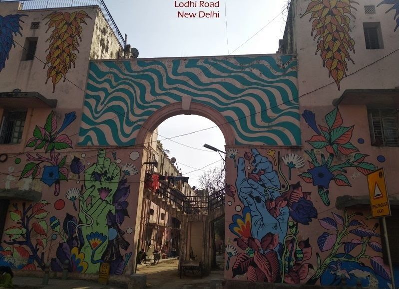 Murals on an entrance arch on Lodi Road Art District in New Delhi