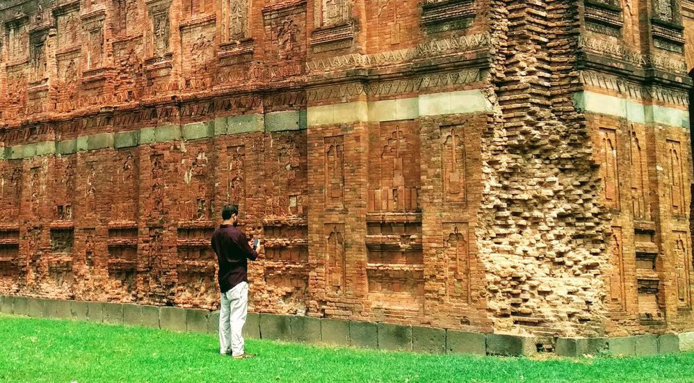 This phot was taken by Asaduzzaman Raju while taking photo at Darasbari Mosque. Darasbari Mosque is a historic mosque that was built in 1479 AD and is located in Shibganj Upazila of Chapai Nawabganj District, Bangladesh. According to an inscription, this brick built mosque was constructed by the restored Iliyas Shahi sultan Shamsuddin Yusuf Shah, son of Barbak Shah. Presently, the mosque has no roof and has a fallen verandah.