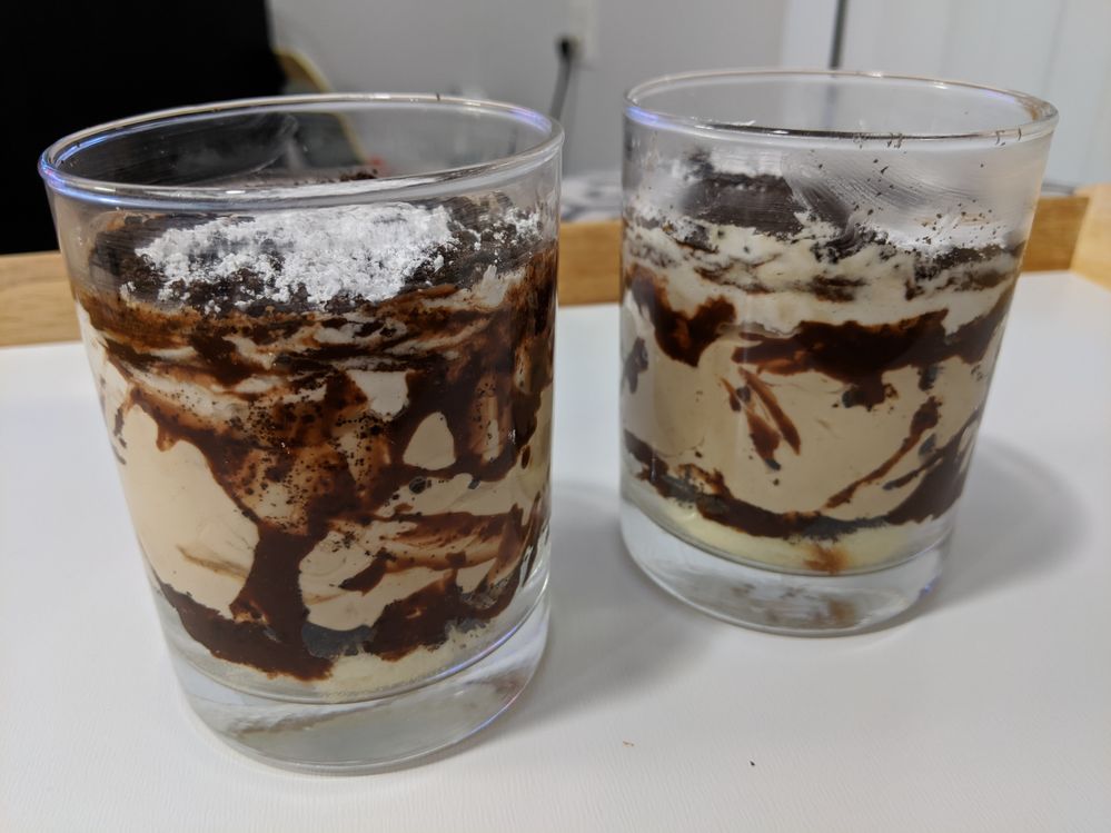 mocha creme mousse with a butter cake base and layers of chocolate and a mouse infused with coffee