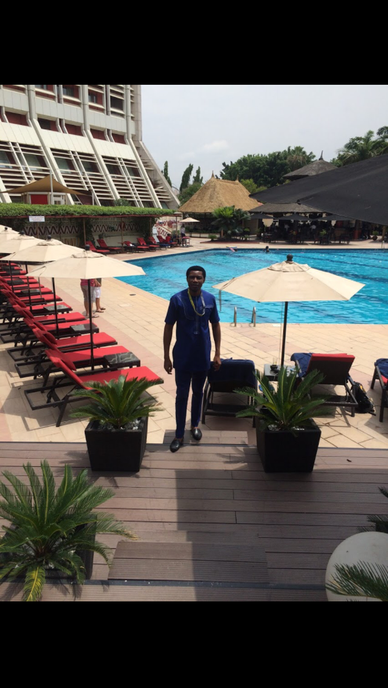 Hilton poolside (That's me in 2016 when organize a food Crawl at the Hilton, Abuja)