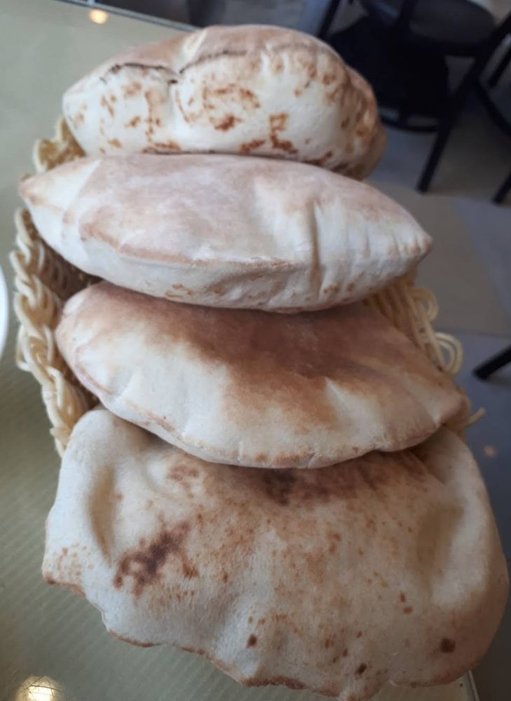Arabian Flat bread "Khubz" arranged in a tray